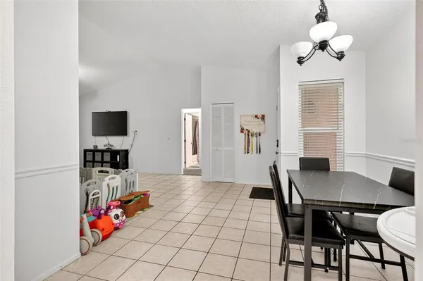 a kitchen with cabinets appliances and a sink
