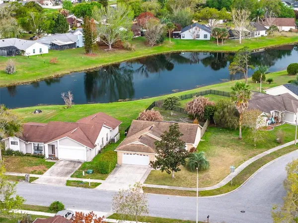 an aerial view of a house with a garden