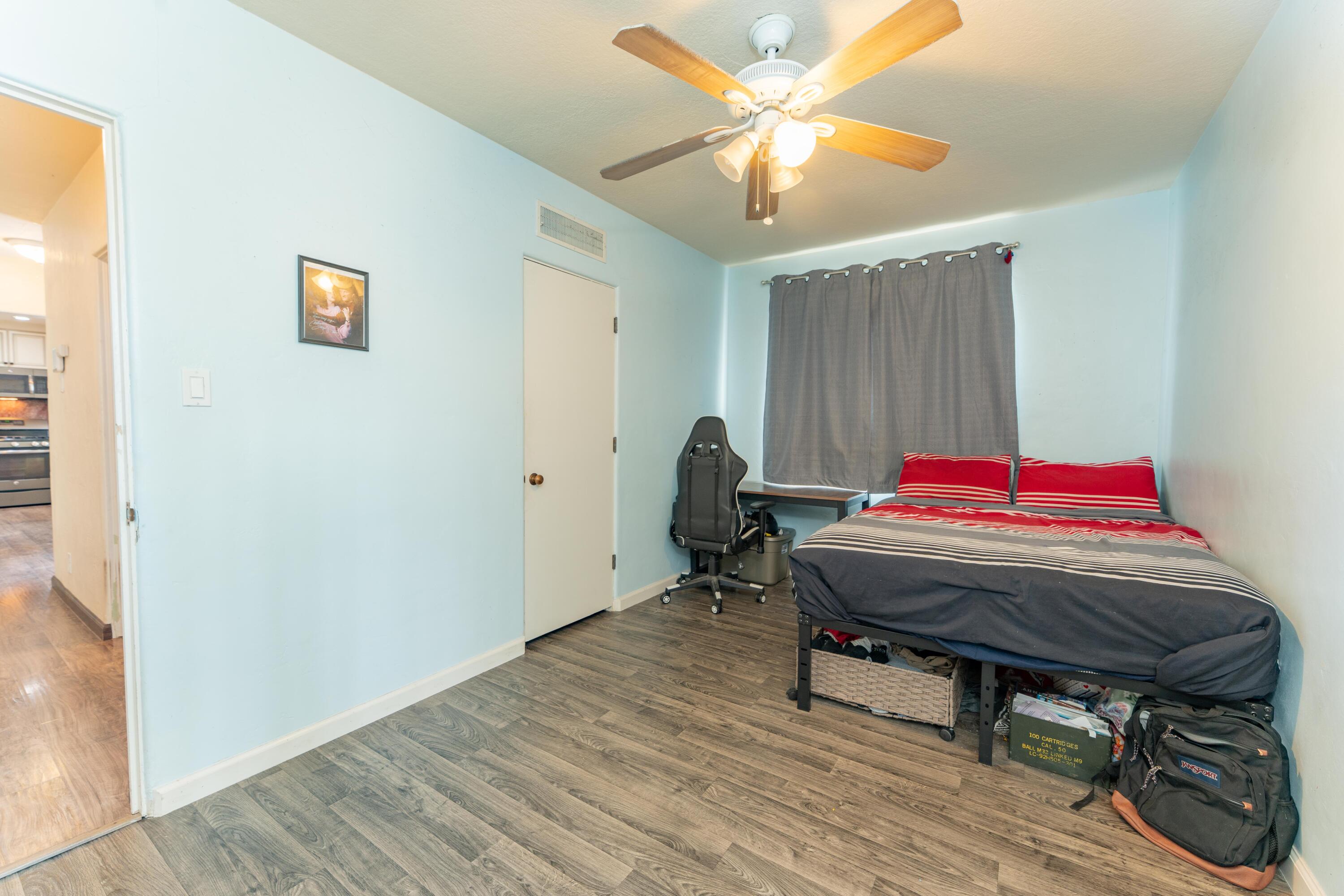 570 North Birch Avenue Reedley, CA 93654 - Photo 33 of 52 a room with a table and a chandelier