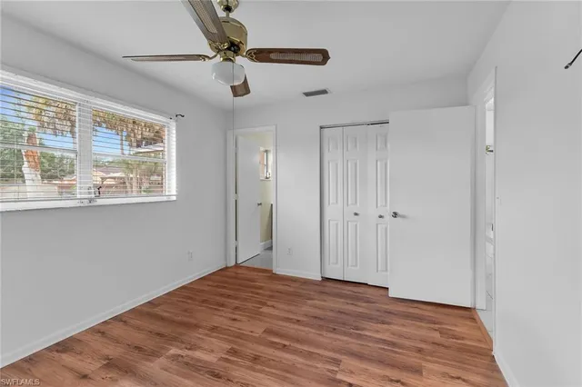 a bathroom with a sink toilet and mirror