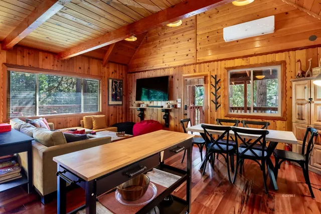 a outdoor dining space with furniture and outdoor view
