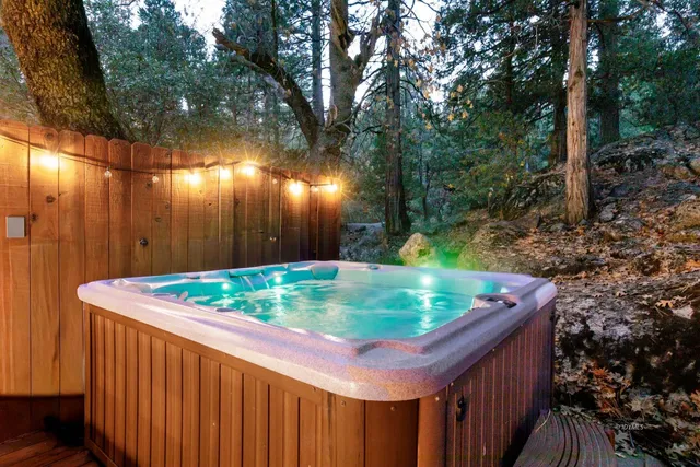a wooden box filled with plants and trees