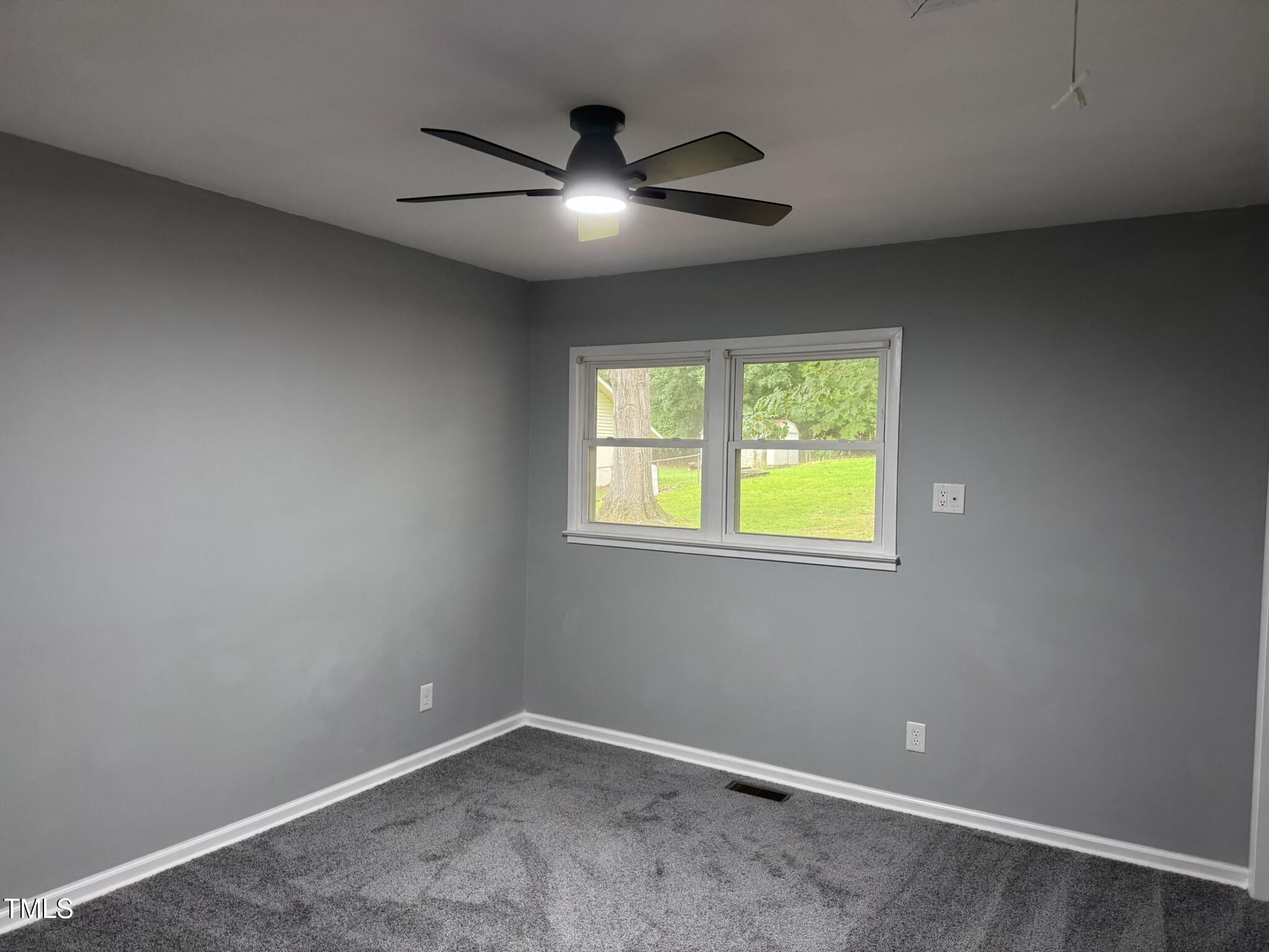 6740 Guess Road Hillsborough, NC 27278 - Photo 10 of 17 a view of an empty room with a window