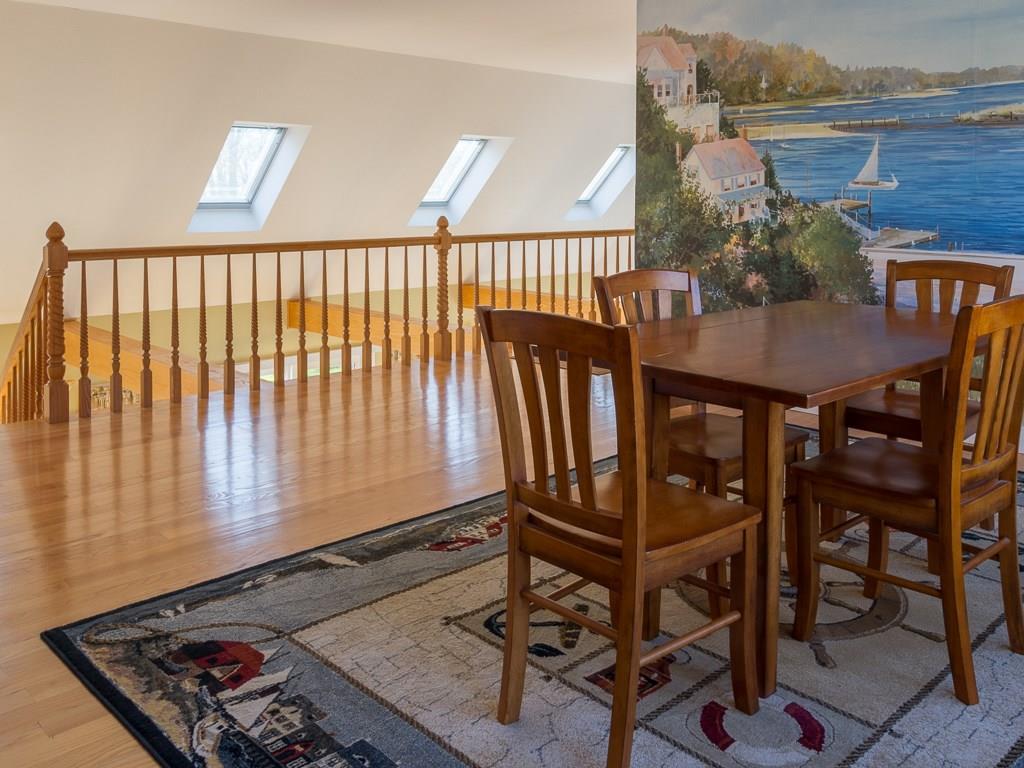 86 Spring Hill Loop Chamberlain, ME 04541 - Photo 13 of 35 Game table on second floor.