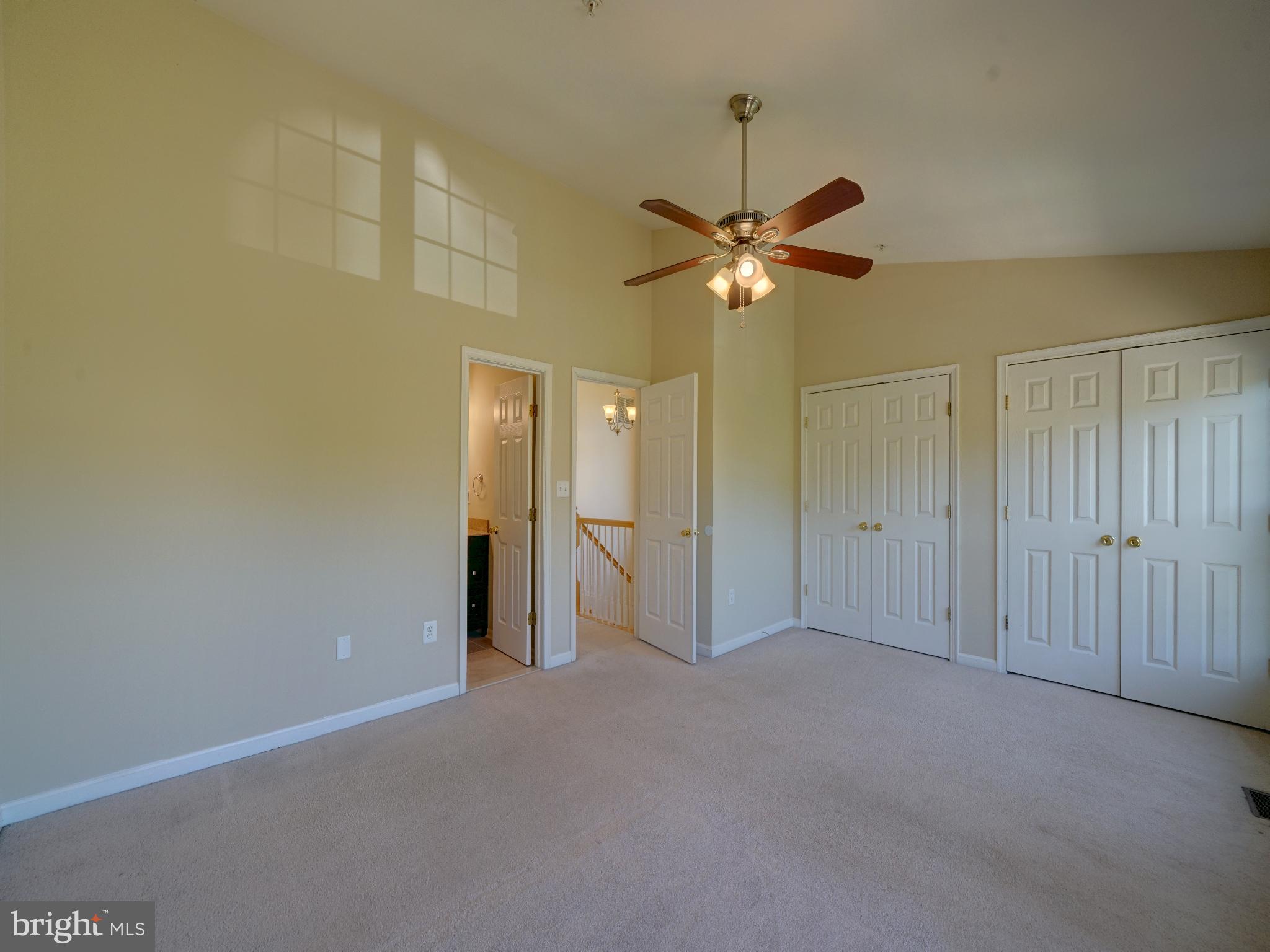 2238 Commissary Circle Odenton, MD 21113 - Photo 19 of 48 a view of an empty room and a ceiling fan