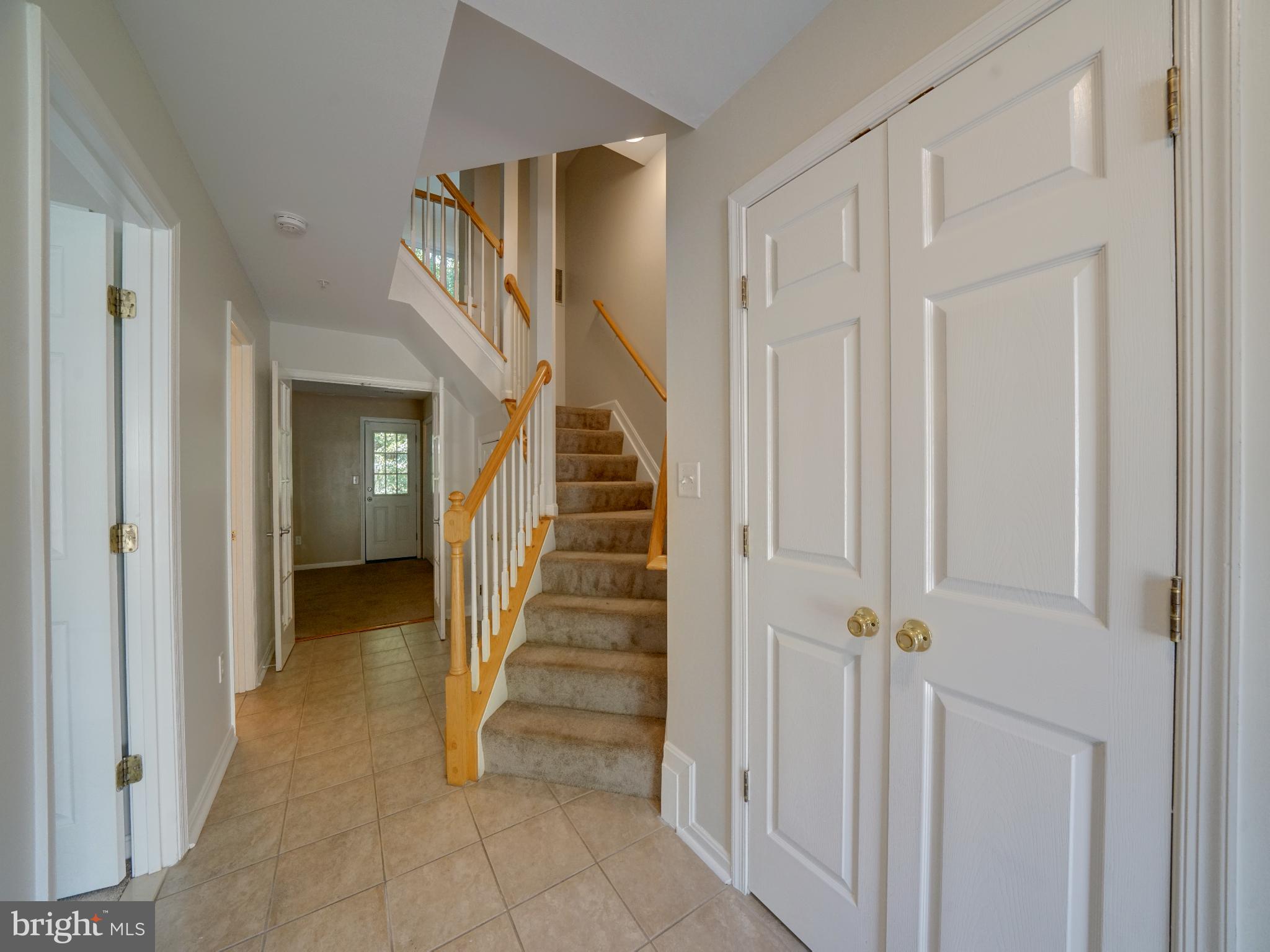 2238 Commissary Circle Odenton, MD 21113 - Photo 2 of 48 a view of an entryway with staircase