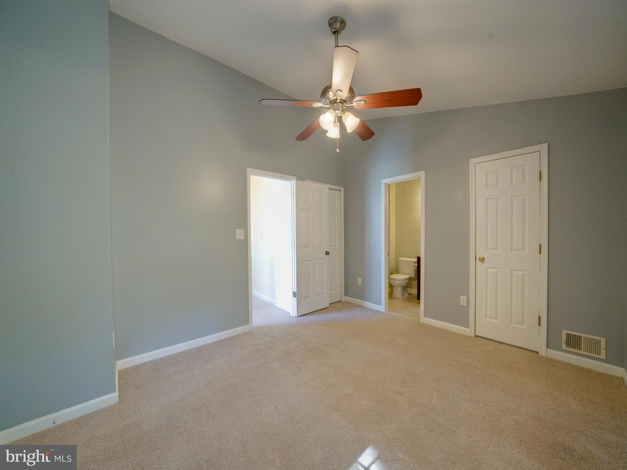 2238 Commissary Circle Odenton, MD 21113 - Photo 25 of 48 a view of a big room with chandelier fan and closet area