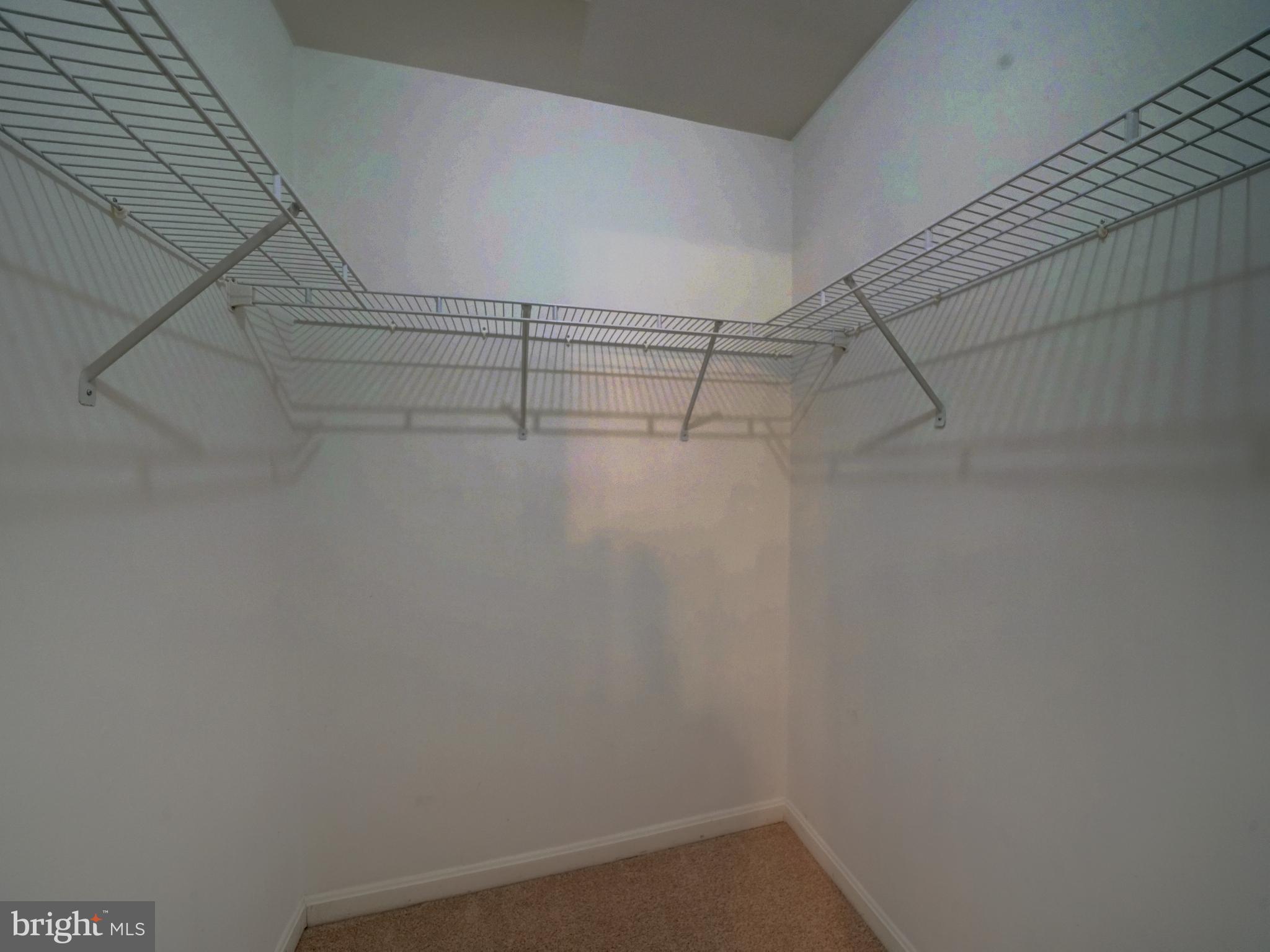 2238 Commissary Circle Odenton, MD 21113 - Photo 28 of 48 a view of a room with racks on the wall