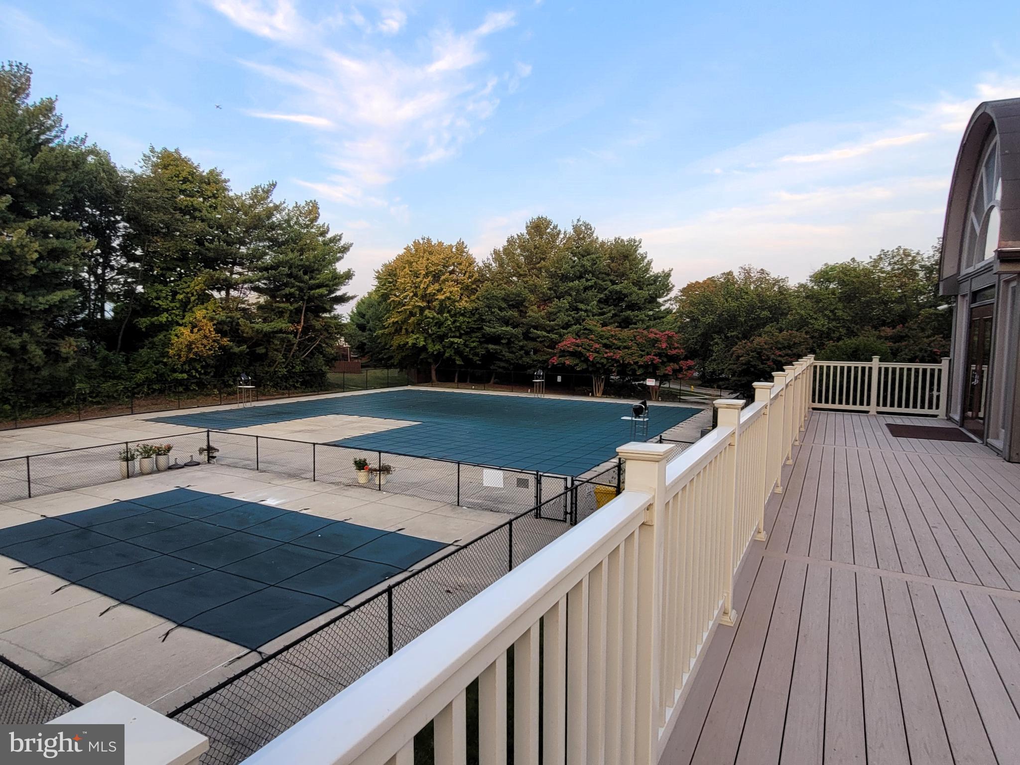 2238 Commissary Circle Odenton, MD 21113 - Photo 45 of 48 a view of a balcony with wooden floor and fence