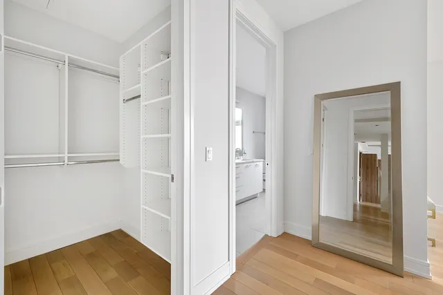 a en suite bathroom with a sink and a mirror