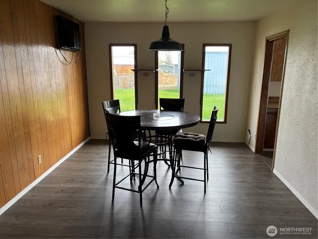 a view of empty room with wooden ceiling