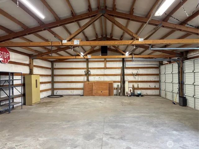a view of an empty room with a garage
