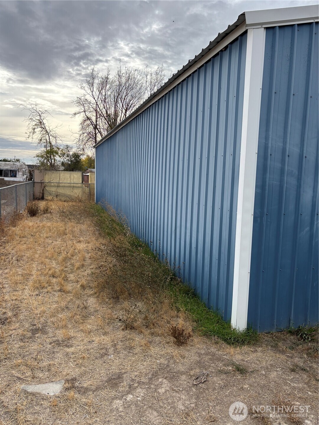 9008 Bong Loop, Unit B Moses Lake, WA 98837 - Photo 24 of 27 a view of a backyard of the house