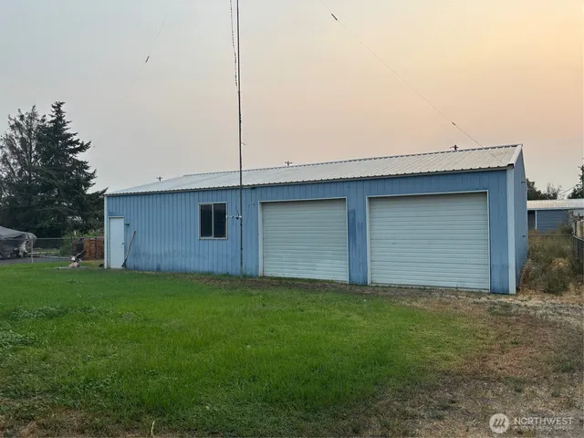 a house view with a garden space
