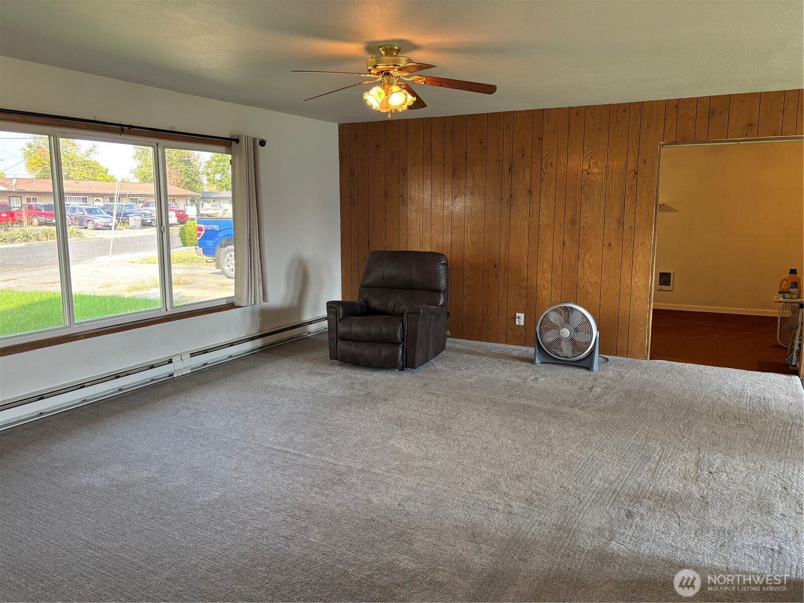 9008 Bong Loop, Unit B Moses Lake, WA 98837 - Photo 5 of 27 a living room with furniture and a large window