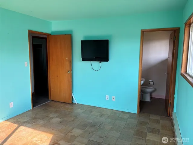 a view of a livingroom with a potted plant