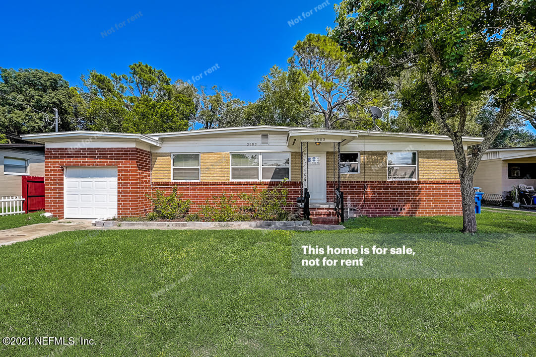 3503 Rogero Road Jacksonville, FL 32277 - Photo 1 of 27 a view of a house with a yard