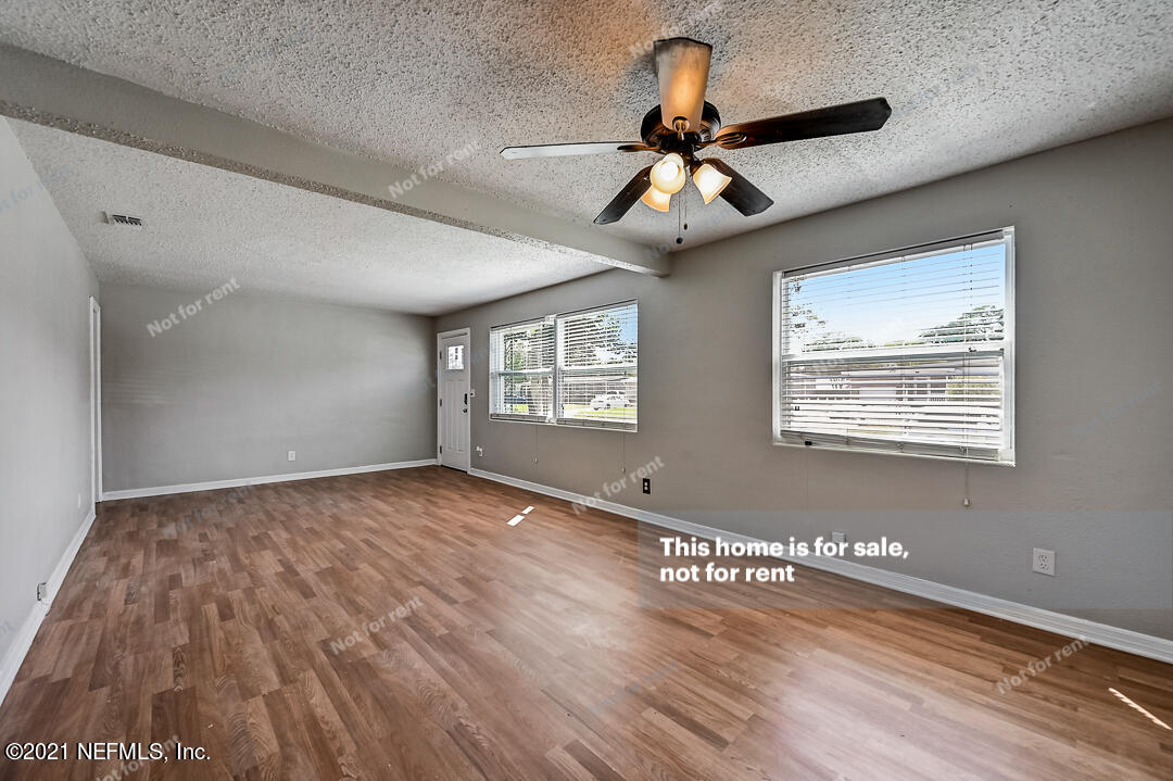 3503 Rogero Road Jacksonville, FL 32277 - Photo 17 of 27 a view of an empty room with a window