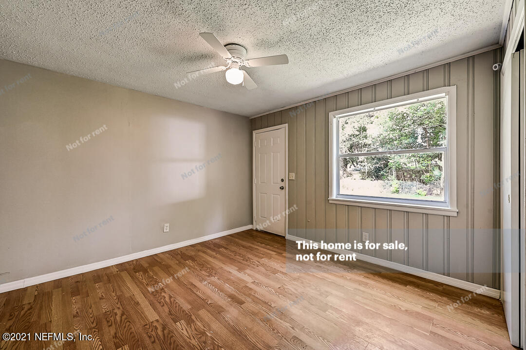 3503 Rogero Road Jacksonville, FL 32277 - Photo 22 of 27 a view of an empty room with a window