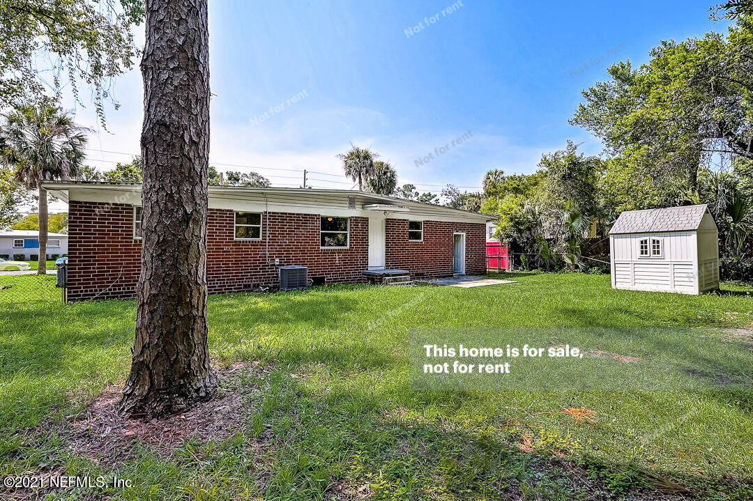 3503 Rogero Road Jacksonville, FL 32277 - Photo 7 of 27 a front view of house with a garden
