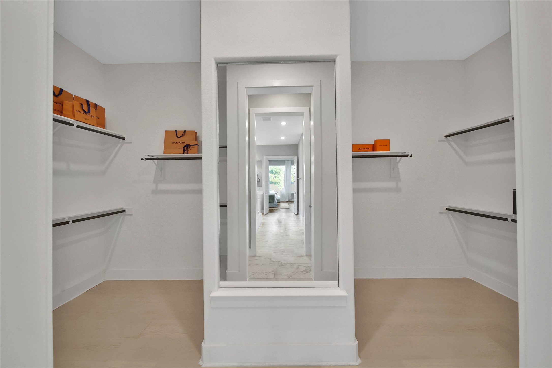 29402 Cir S Rnch Trail Fulshear, TX 77406 - Photo 29 of 50 This walk-in primary closet offers a full-length dressing mirror for added convenience.