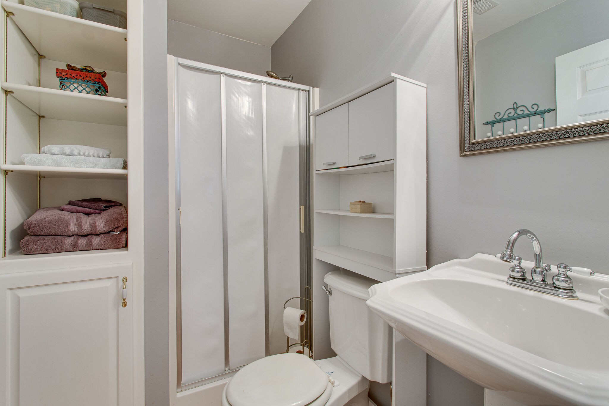 658 Cedar Mountain Place Decherd, TN 37324 - Photo 23 of 53 a bathroom with a sink toilet and vanity