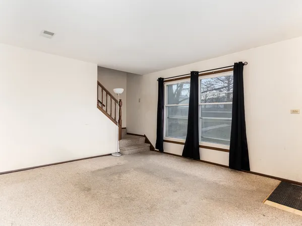 an empty room with windows