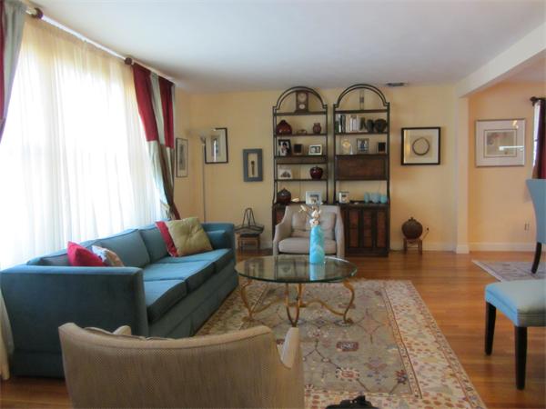 4 Oriole Road Wellesley, MA 02481 - Photo 4 of 14 a living room with furniture and a flat screen tv