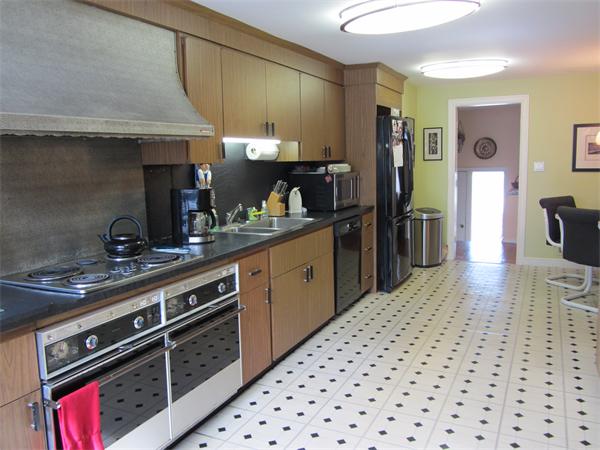 4 Oriole Road Wellesley, MA 02481 - Photo 7 of 14 a kitchen with stainless steel appliances a sink dishwasher stove refrigerator and cabinets