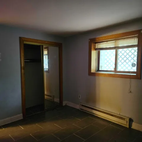 an empty room with windows