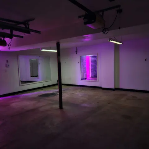 a view of empty room with red walls