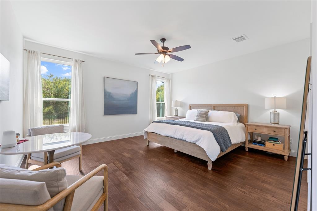 5244 Ranchero Trail Fort Worth, TX 76126 - Photo 13 of 31 Bedroom with wood finished floors and a ceiling fan