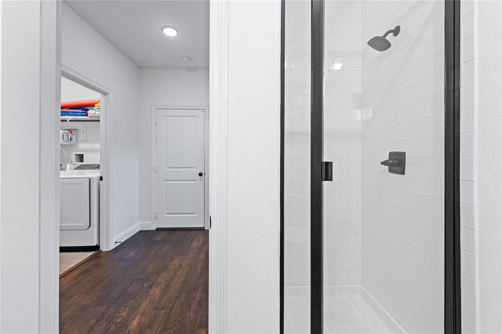 5244 Ranchero Trail Fort Worth, TX 76126 - Photo 23 of 31 Hall featuring dark wood-style floors, independent washer and dryer, and recessed lighting