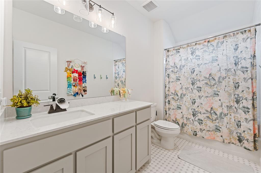 5244 Ranchero Trail Fort Worth, TX 76126 - Photo 29 of 31 Full bath featuring vanity and shower / bath combo