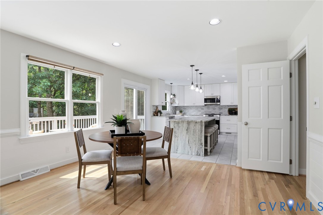 2904 Old Gun Road West Midlothian, VA 23113 - Photo 17 of 59 Open-concept dining area featuring wood-finish flo
