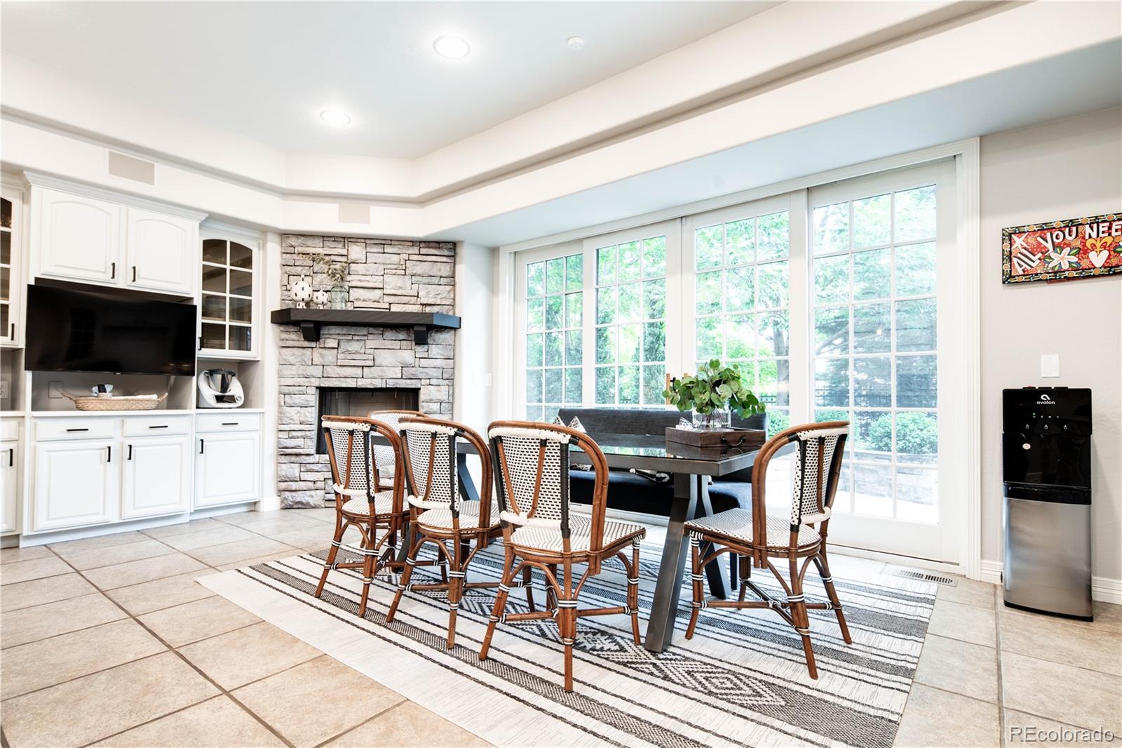 1 Ravenswood Road Cherry Hills Village, CO 80113 - Photo 17 of 40 a view of a dining room with furniture window and outside view