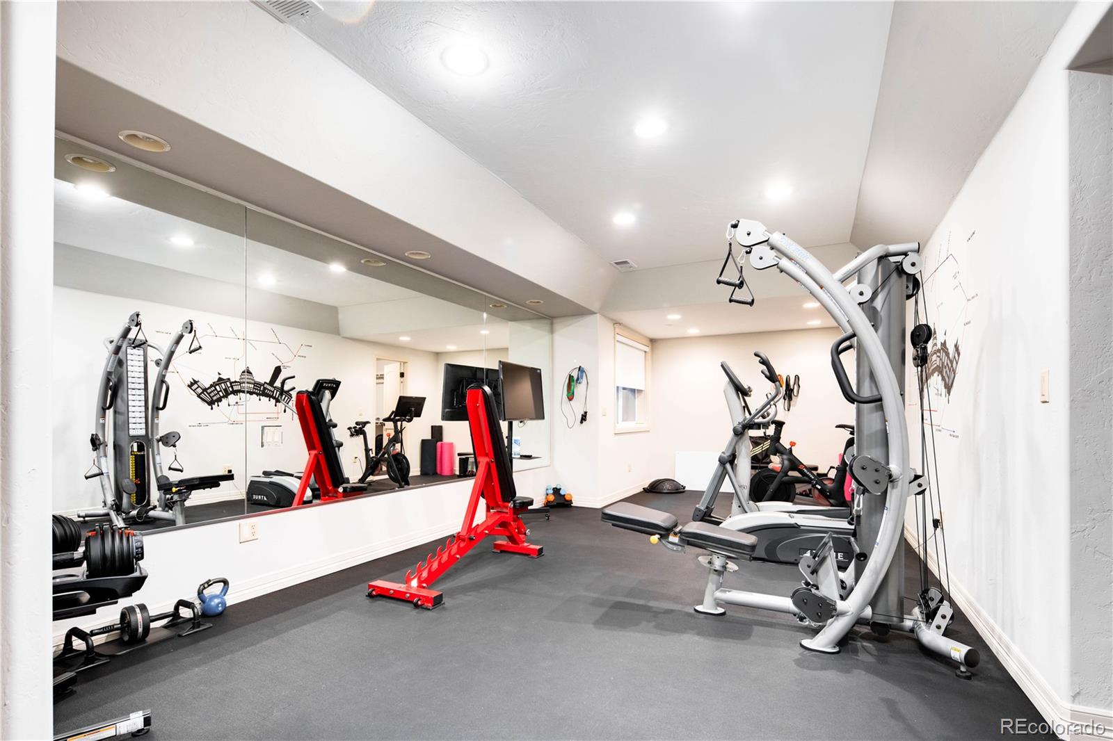 1 Ravenswood Road Cherry Hills Village, CO 80113 - Photo 25 of 40 a view of a room with gym equipment