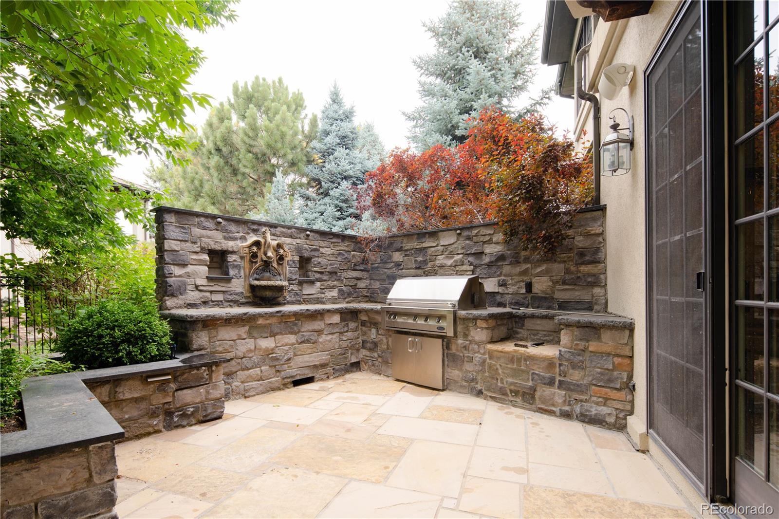 1 Ravenswood Road Cherry Hills Village, CO 80113 - Photo 40 of 40 a view of backyard with outdoor seating