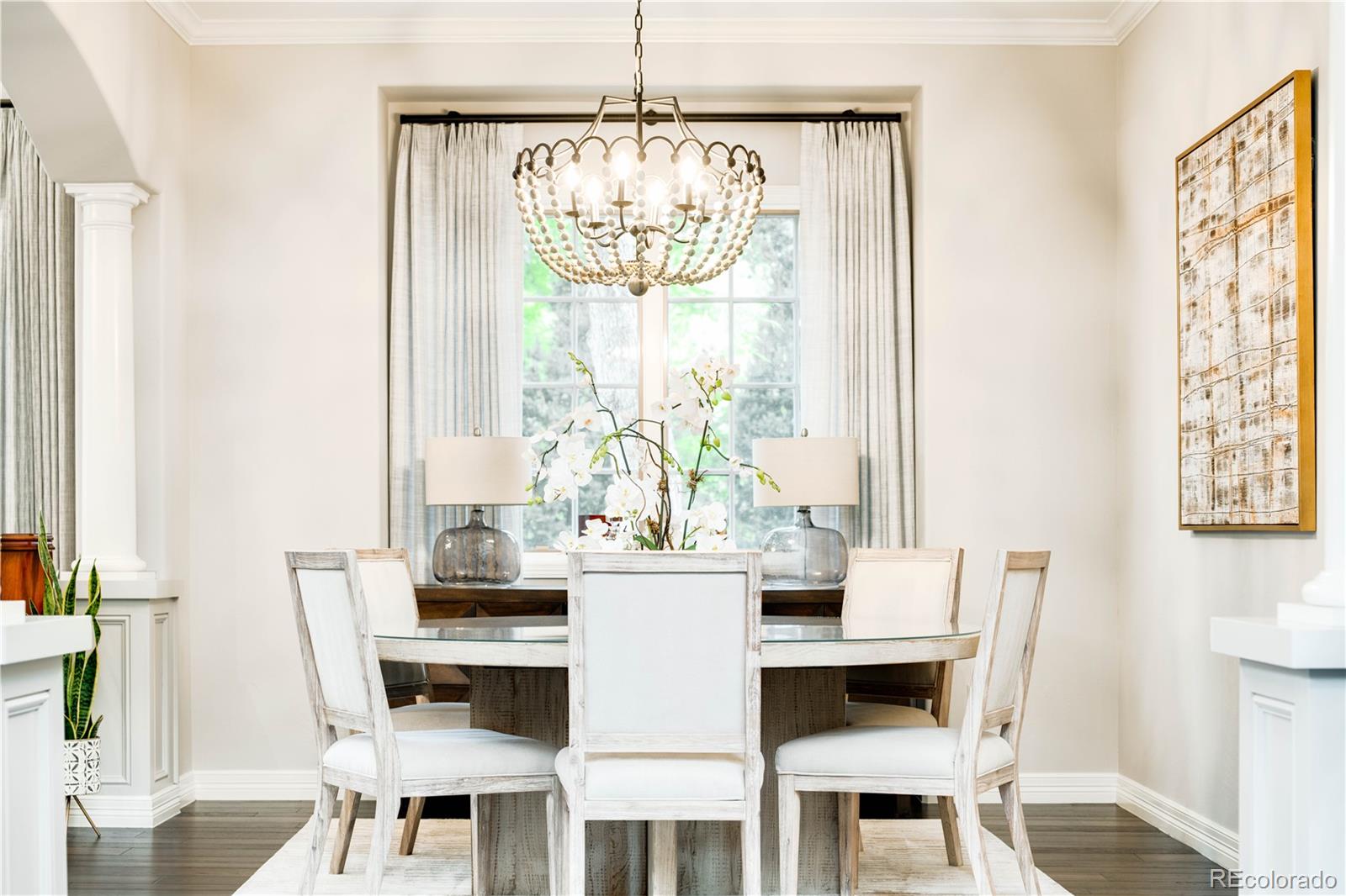 1 Ravenswood Road Cherry Hills Village, CO 80113 - Photo 10 of 40 a view of a dining room with furniture window and outside view