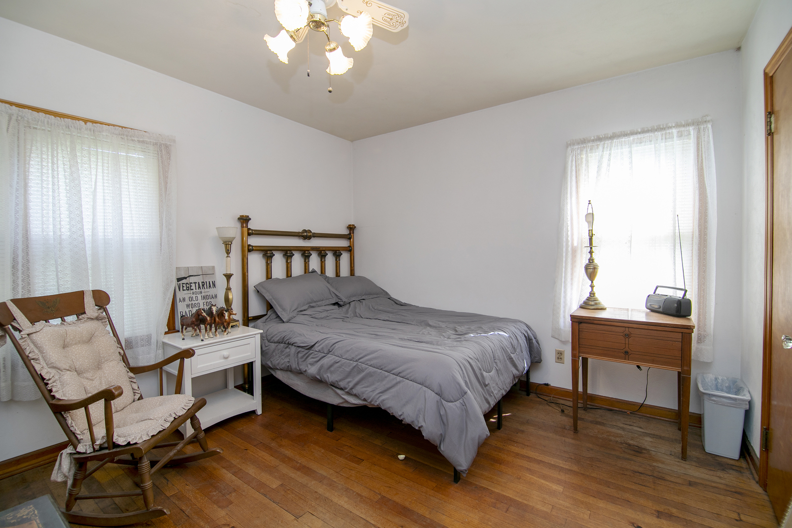 12710 West 1000N Road Herscher, IL 60941 - Photo 11 of 30 a living room with a bed furniture and a window