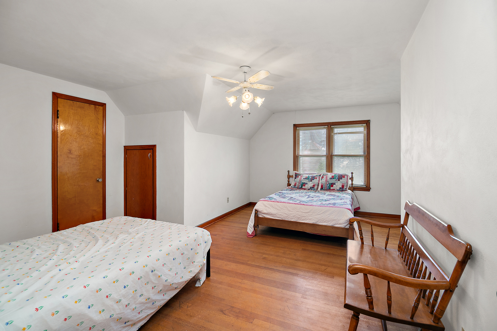 12710 West 1000N Road Herscher, IL 60941 - Photo 13 of 30 a bedroom with a bed and wooden floor