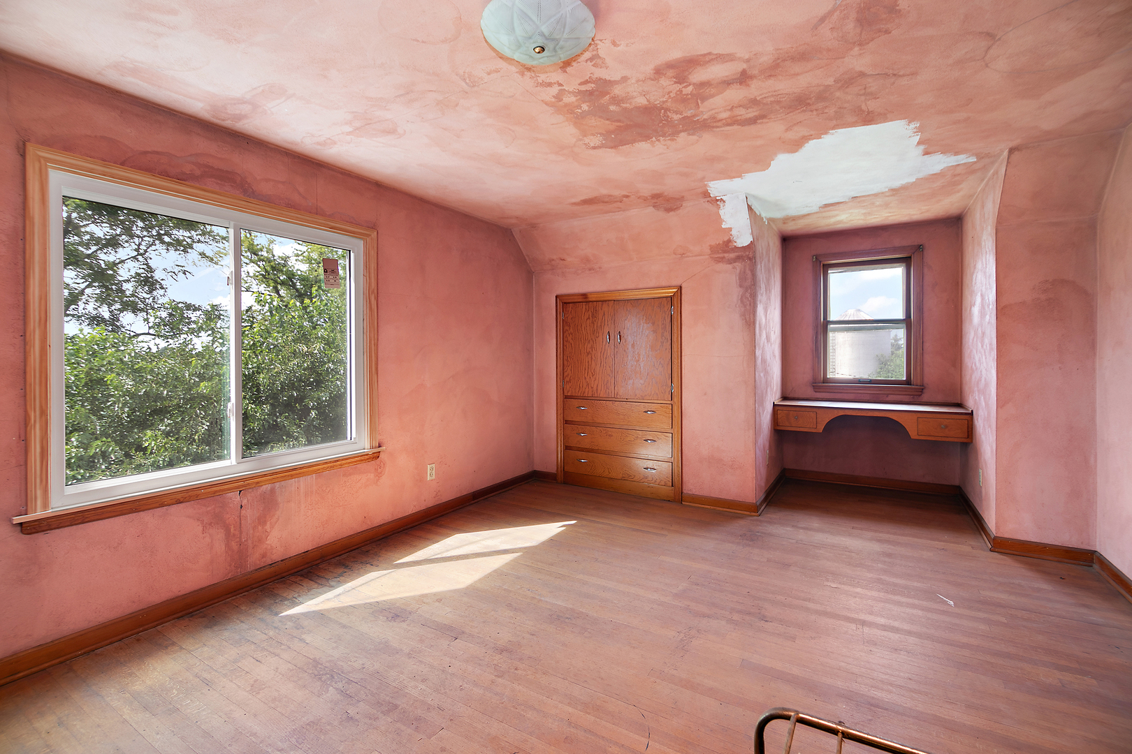 12710 West 1000N Road Herscher, IL 60941 - Photo 15 of 30 an empty room with wooden floor and windows