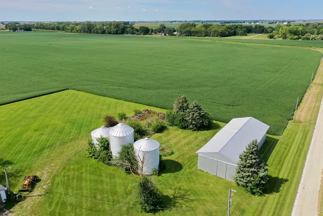 a view of a lake with a yard