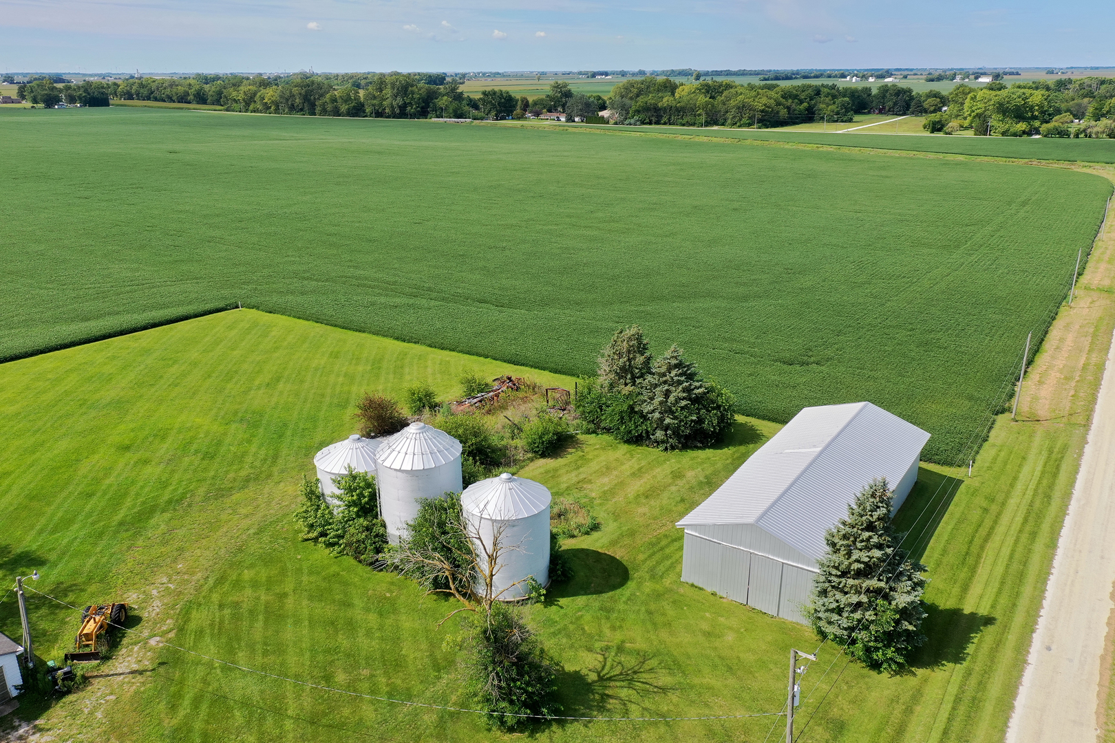 12710 West 1000N Road Herscher, IL 60941 - Photo 20 of 30 a view of a lake with a yard