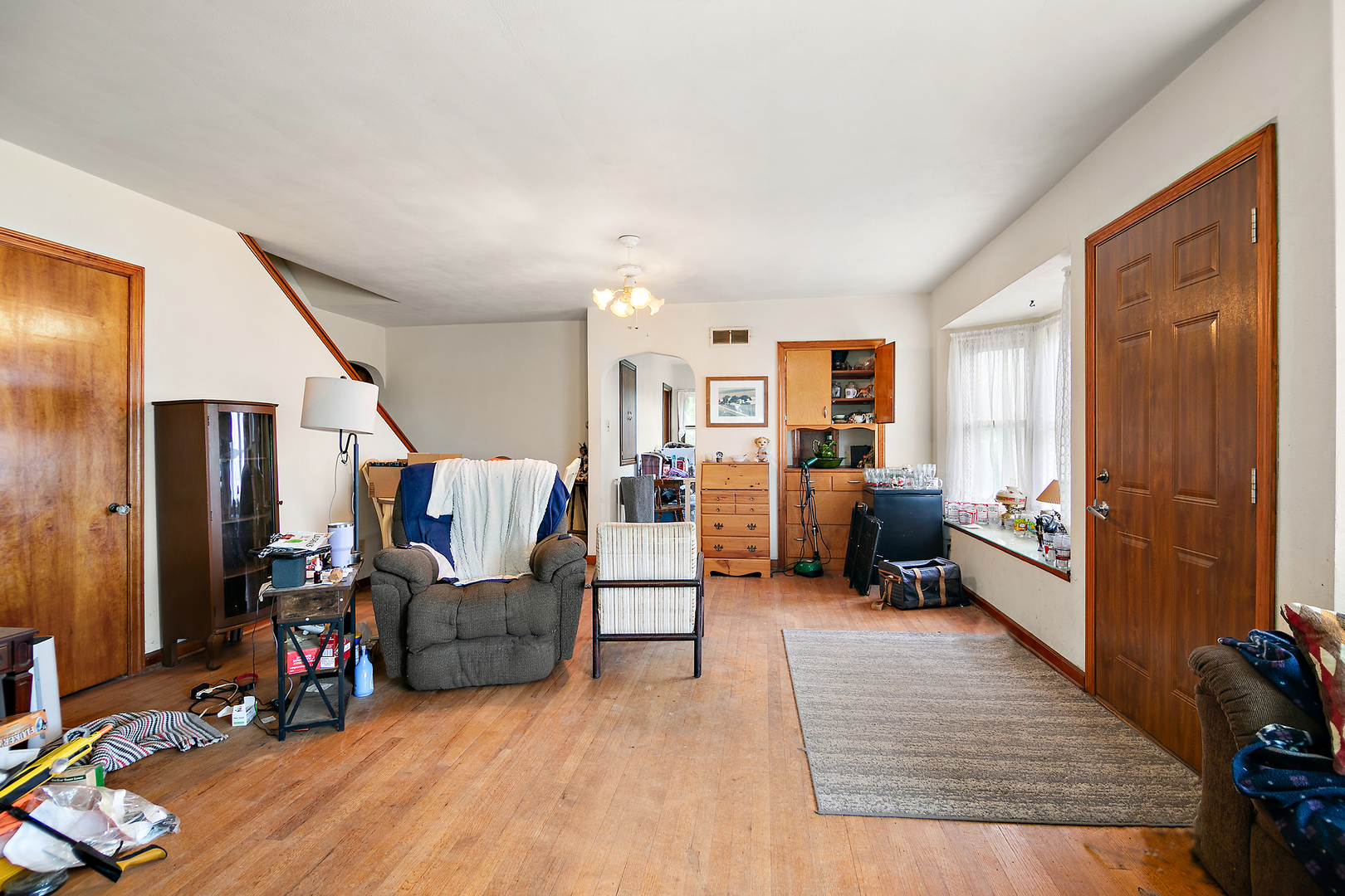 12710 West 1000N Road Herscher, IL 60941 - Photo 2 of 30 a living room with furniture and a wooden floor