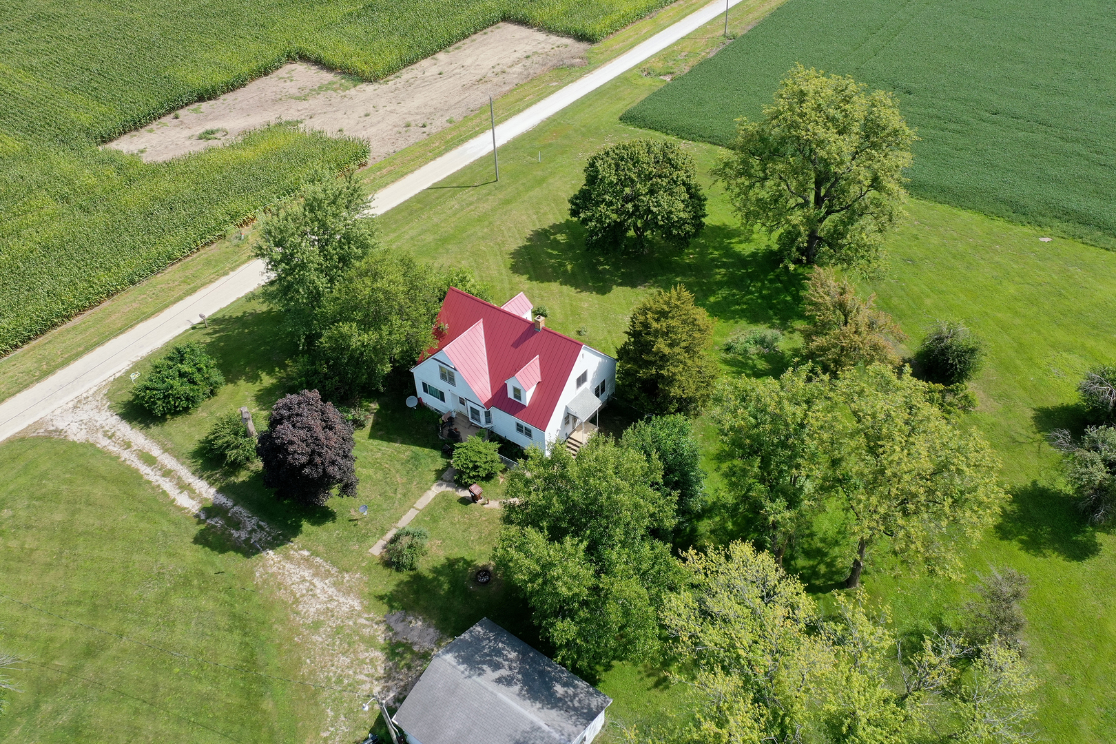 12710 West 1000N Road Herscher, IL 60941 - Photo 25 of 30 a aerial view of a house with a yard