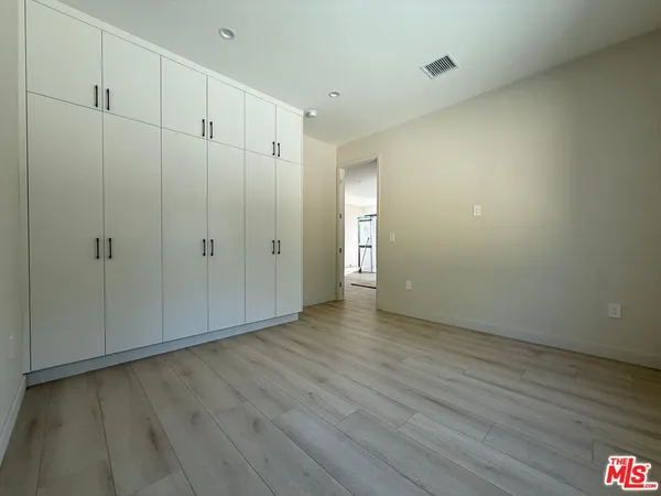 a bathroom with a shower toilet and sink