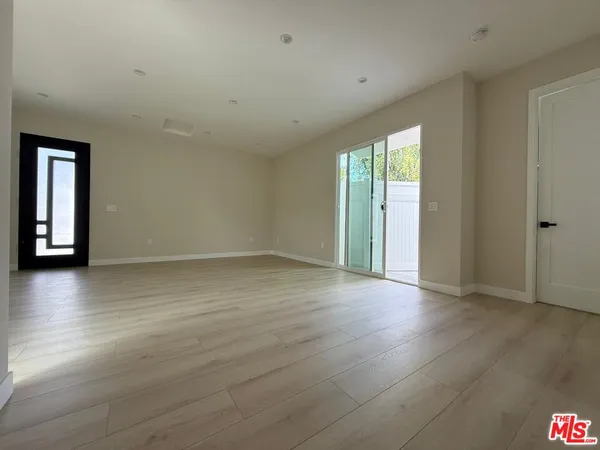 a view of a hallway view with staircase