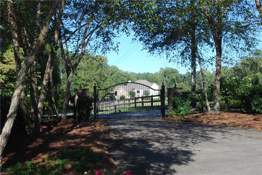 Welcome home to your idyllic, truly gorgeous equestrian property so close to Atlanta