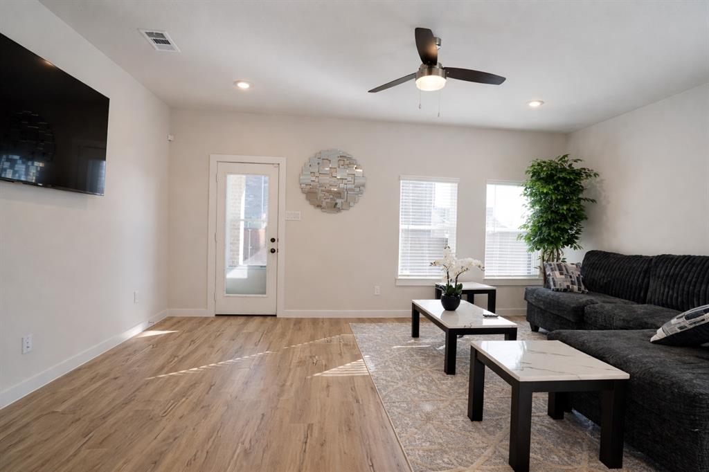 655 Scarlett Street Forney, TX 75126 - Photo 12 of 24 Living area with light wood finished floors, a ceiling fan, and recessed lighting